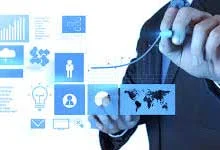 A Business professional in a suit with a blue tie interacting with digital data visuals, including graphs, icons, and world map that convey technology and analytics theme.