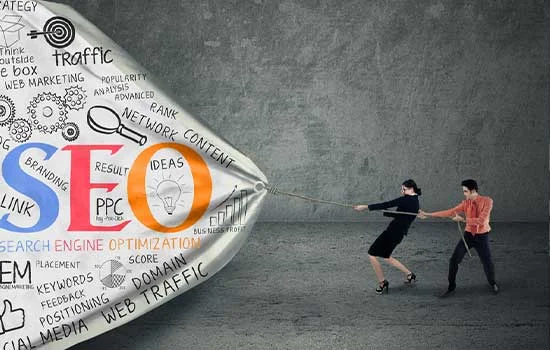 Two people tug at a large, fabric-like SEO graphic sheet filled with marketing keywords. The scene conveys teamwork in digital marketing. Keywords emphasize the theme.